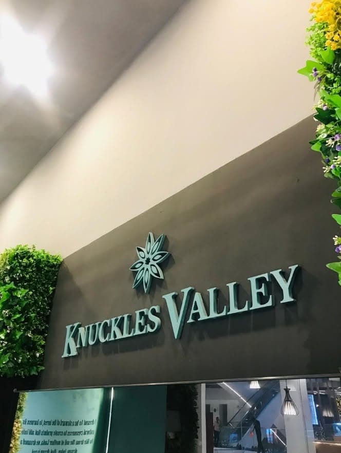 The Knuckles Valley name and emblem appear above the store entrance at City of Dreams.