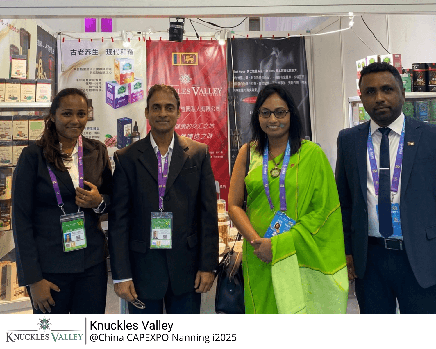 Four representatives stand together at the Knuckles Valley exhibition stand in Nanning.